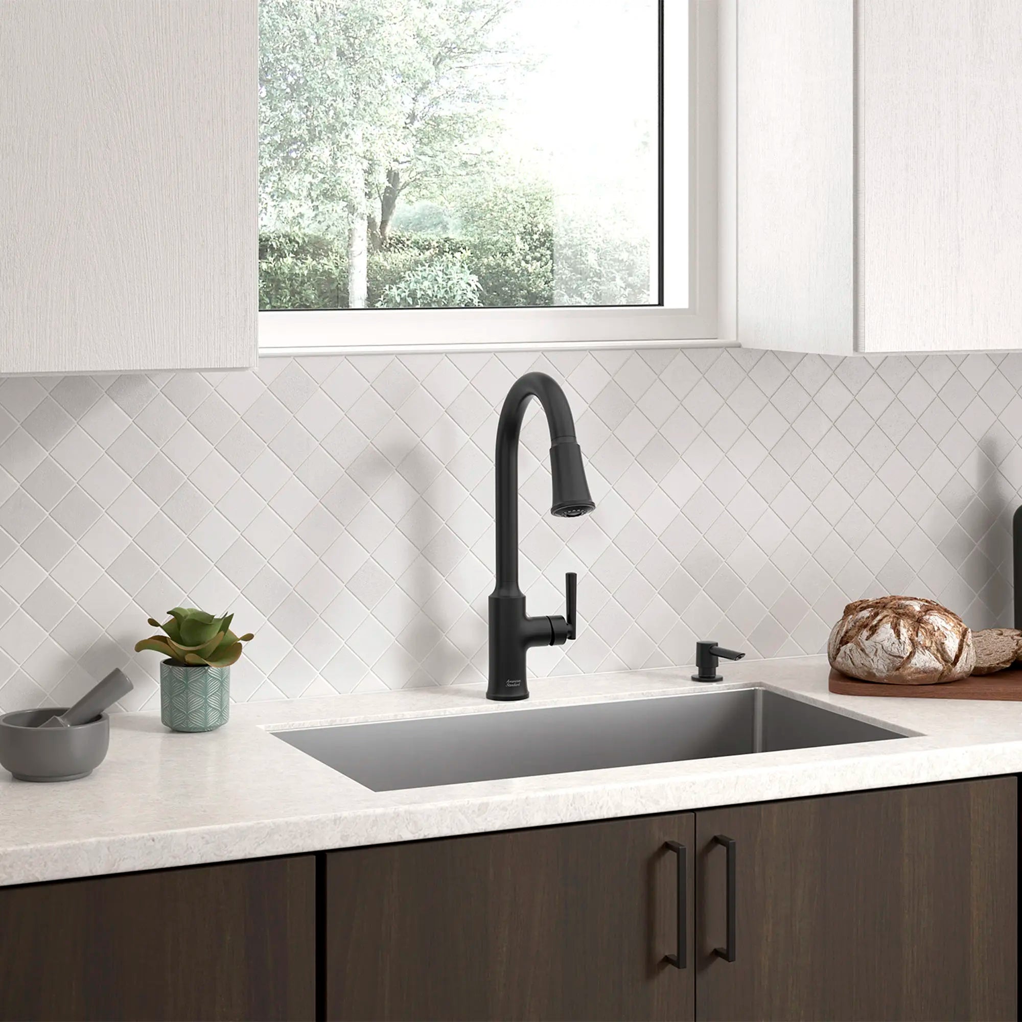 Raviv® Single-Handle Pull-Down Kitchen Faucet // MATTE BLACK // 168977_Raviv_Environment_7421300.243_0004_Apr2023_0_CDNwebp_170304dc-510d-444c-b46c-682a33a46eb3.webp