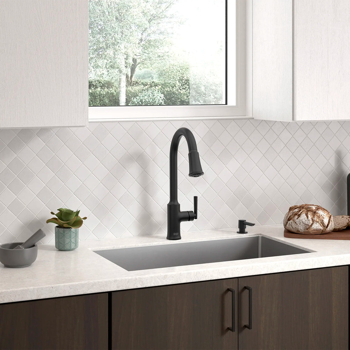 Raviv® Single-Handle Pull-Down Kitchen Faucet // MATTE BLACK // 168977_Raviv_Environment_7421300.243_0004_Apr2023_0_CDNwebp_3e0ef83d-06bb-480f-b7eb-ddda4b0745d8.webp