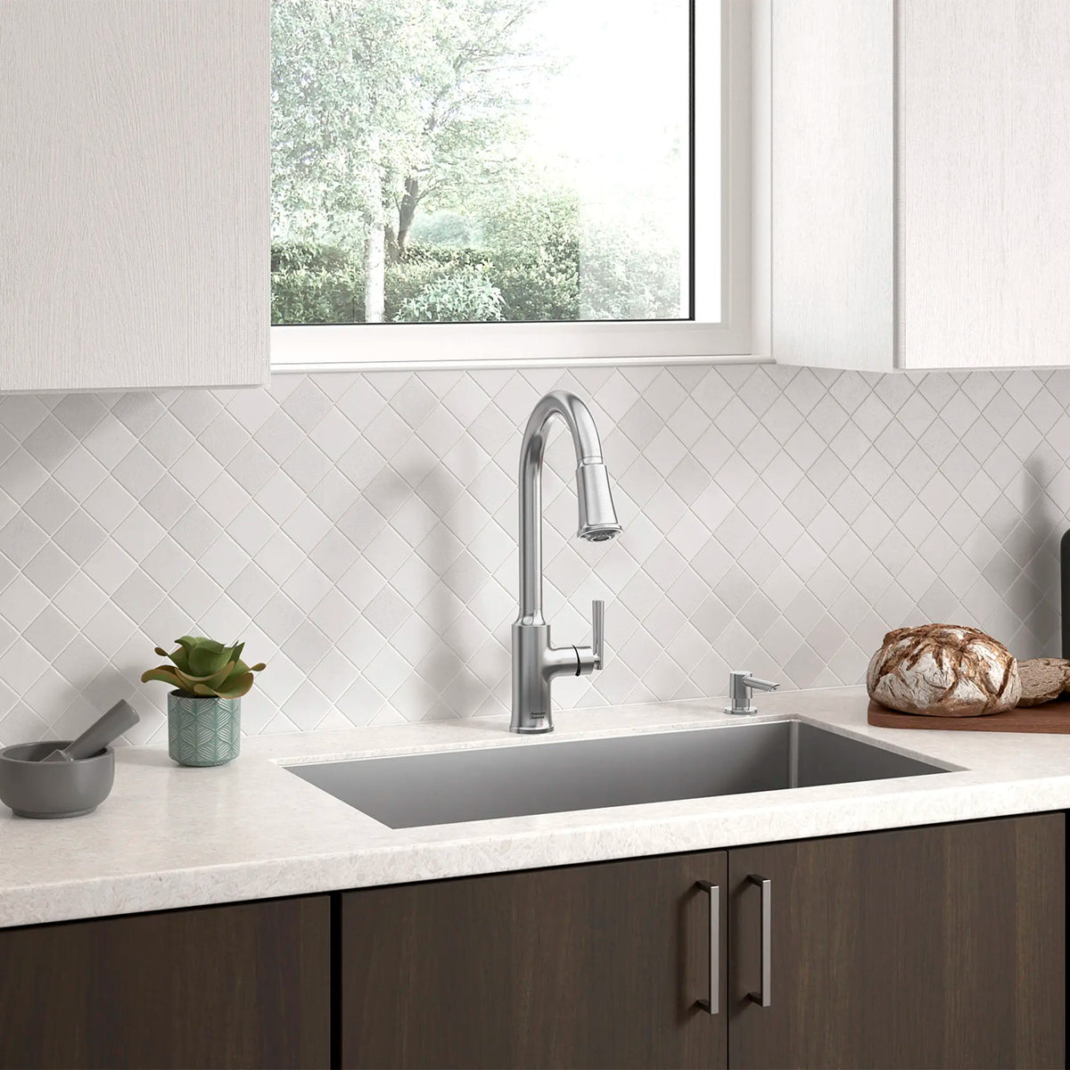 Raviv® Single-Handle Pull-Down Kitchen Faucet // STAINLESS STEEL // 168982_Raviv_Environment_7421300.075_0004_Apr2023_0_CDNwebp_ad2fe96e-1a12-431d-8497-9099c42cd276.webp
