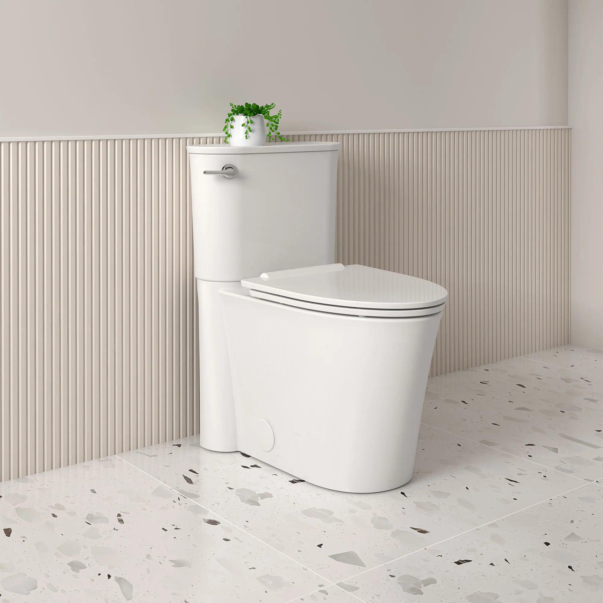 Studio® S Skirted Two-Piece 1.28 gpf/4.8 Lpf Chair Height Elongated Toilet With Seat // LEFT / WHITE // 169569_B-226AA104.020_2_0_CDNwebp_6e4533c3-8b65-4c1b-94e0-e3db2a9f89be.webp