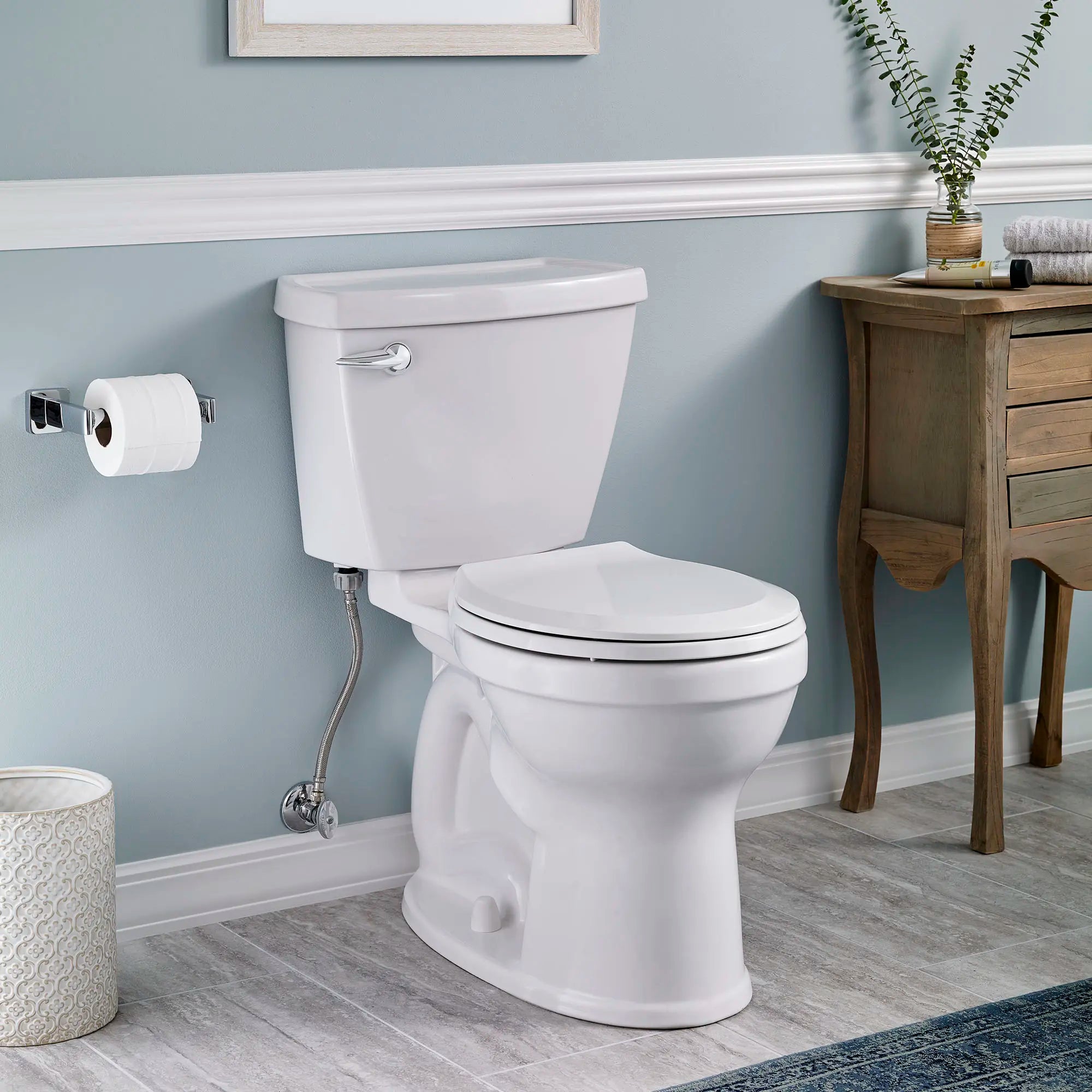 Champion 4 Two-Piece 1.28 gpf/4.8 Lpf Chair Height Round Front Toilet with Seat // WHITE // 173569_B-731BA101S020_0_CDNwebp.webp