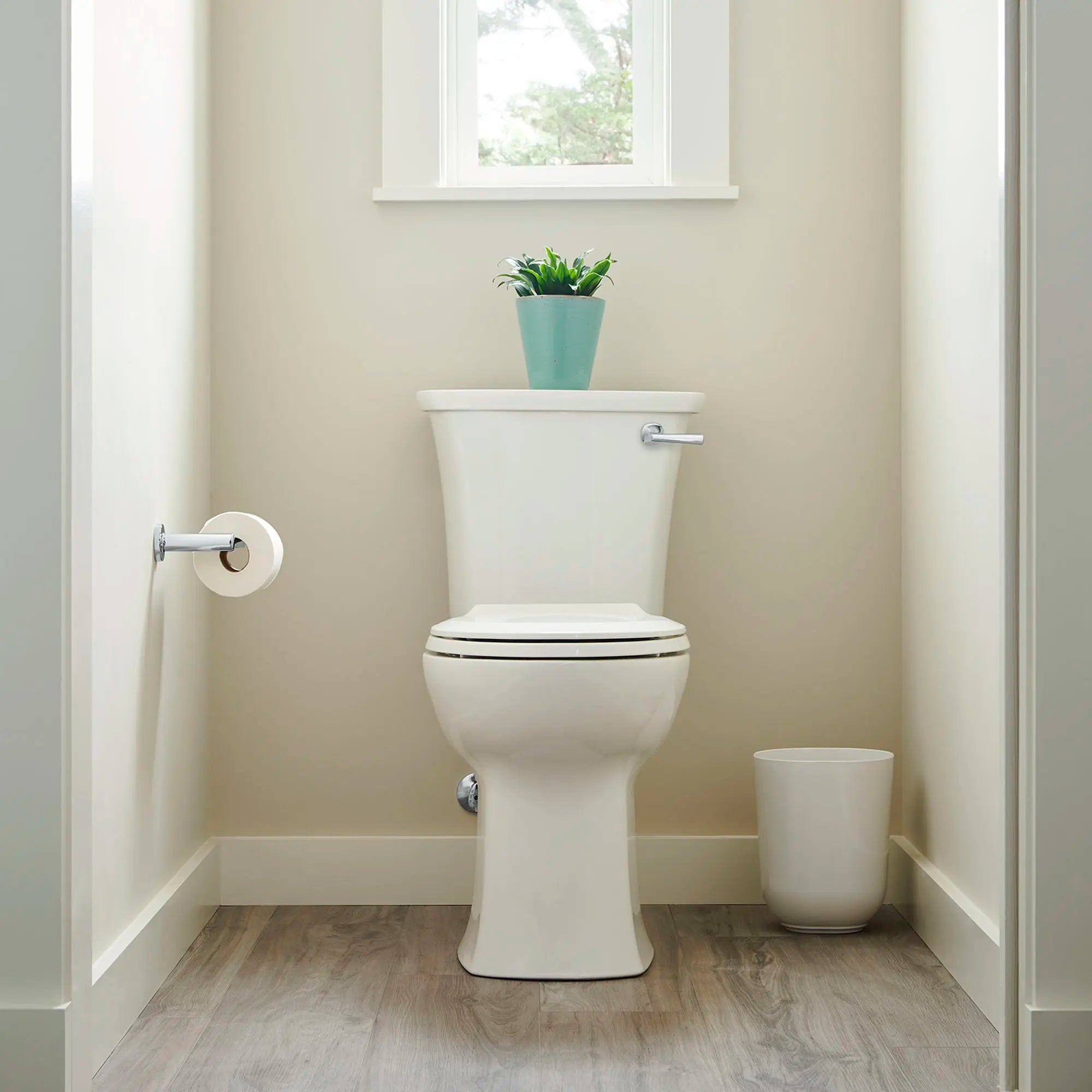 Edgemere® Two-Piece 1.28 gpf/4.8 Lpf Chair-Height Round-Front Right-Hand Trip Lever Toilet Less Seat // WHITE // 174497_B-204BA105.020_0_CDNwebp.webp