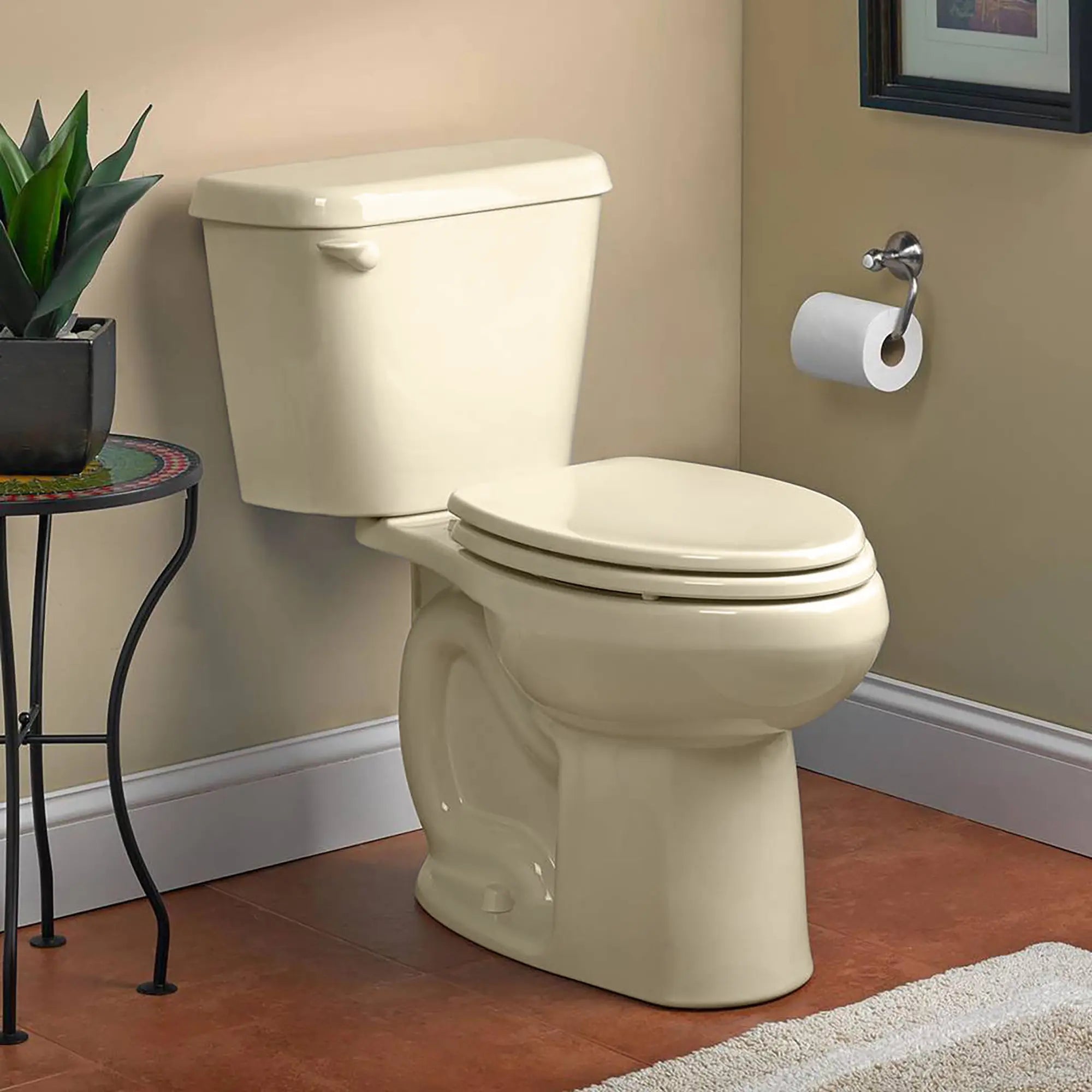 Colony 1.28 GPF/4.8 LPF Left Trip Lever 16-1/2-in. Elongated-Front Toilet with Seat // BONE // 175243_B-751AA101.021_0_CDNwebp.webp