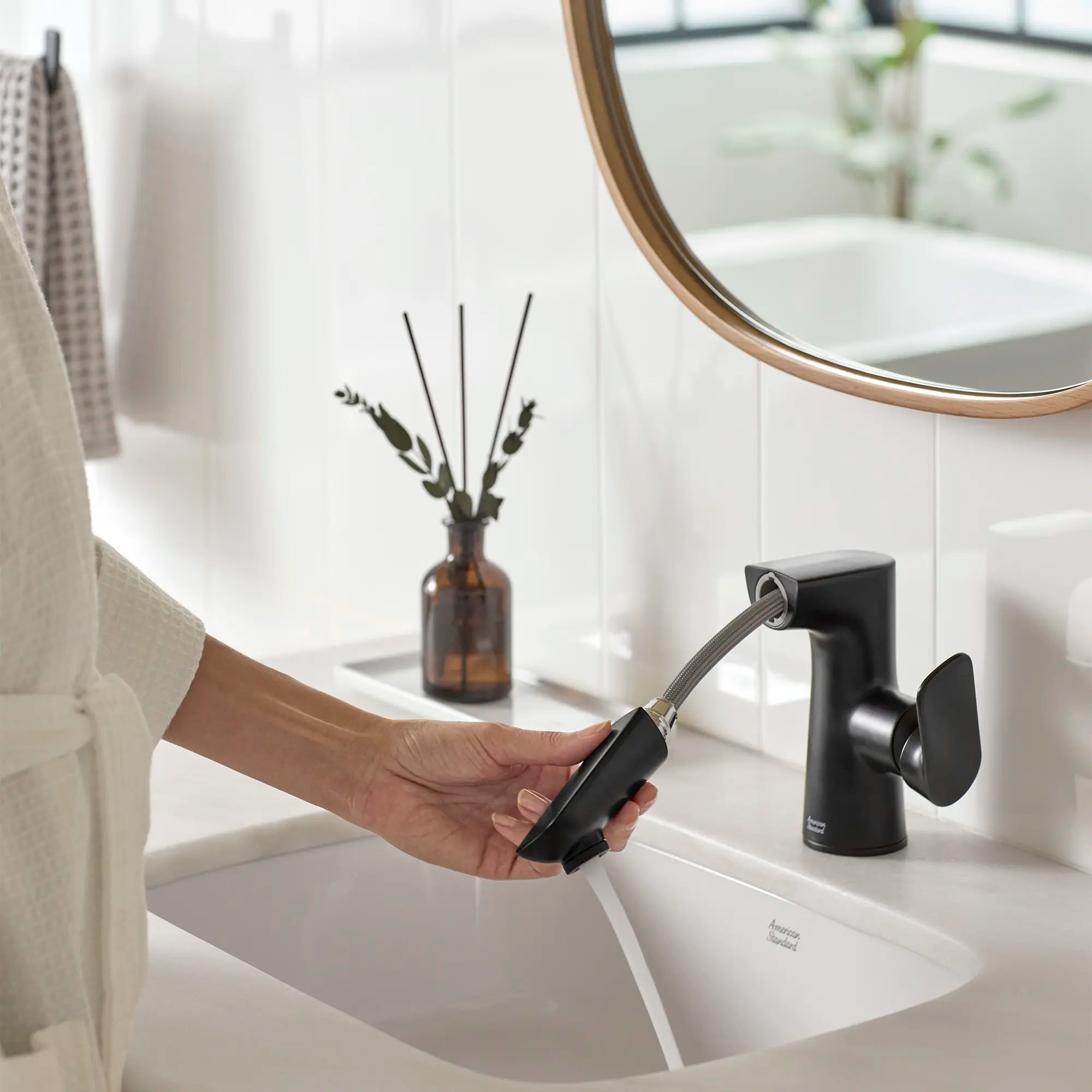 Aspirations Single-Handle Pull-Out Bathroom Faucet 1.2 gpm/4.5 L/min With Lever Handle // MATTE BLACK // 231969_Aspirations_Lifestyle_7061121.243_1607000.020_0001_Nov2023_0_CDNwebp.webp