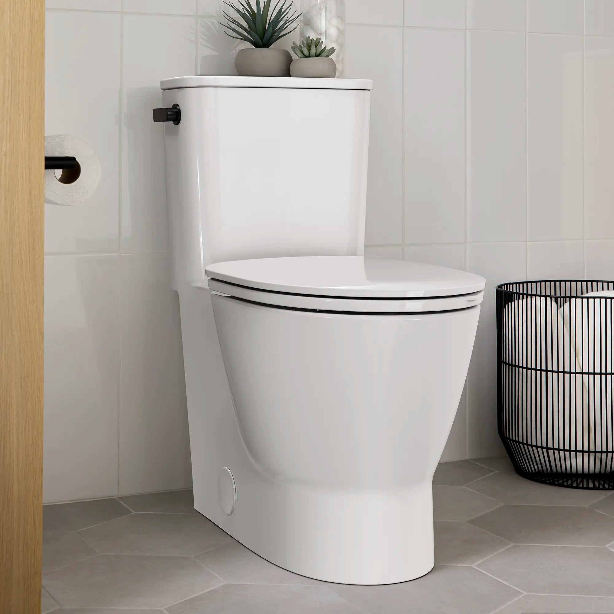 EcoStrength Aspirations Skirted One-Piece 0.80 gpf/3.0 Lpf Chair Height Elongated Toilet With Seat // WHITE // 237864_Aspirations_Ecostrength_EnvironmentCloseUp_2828A809.020_0001_FEBRUARY2024_CDNwebp.webp