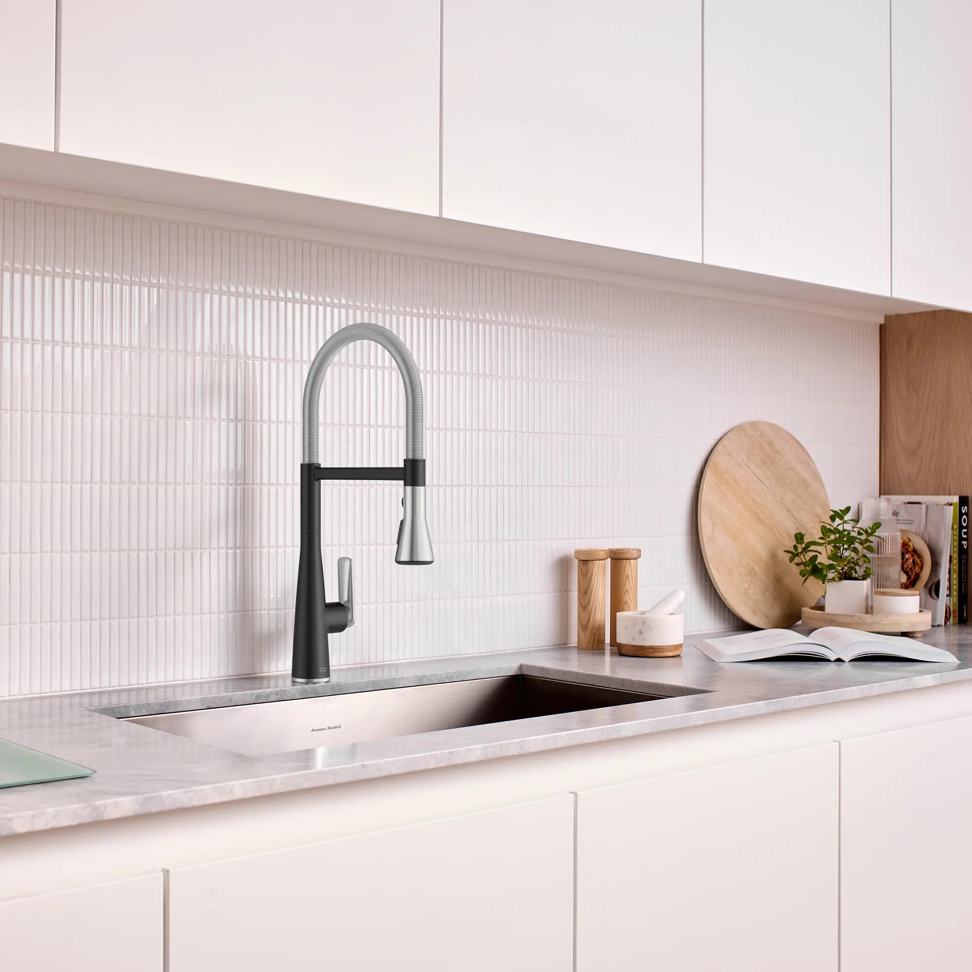 Aspirations Semi-Pro Kitchen Faucet // MATTE BLACK/STAINLESS STEEL // 263013_Aspirations_EnvironmentCloseUp_1048824230_0001_May2025_0_CDNwebp_ef60816a-8454-49b5-befe-f3b806f41107.webp