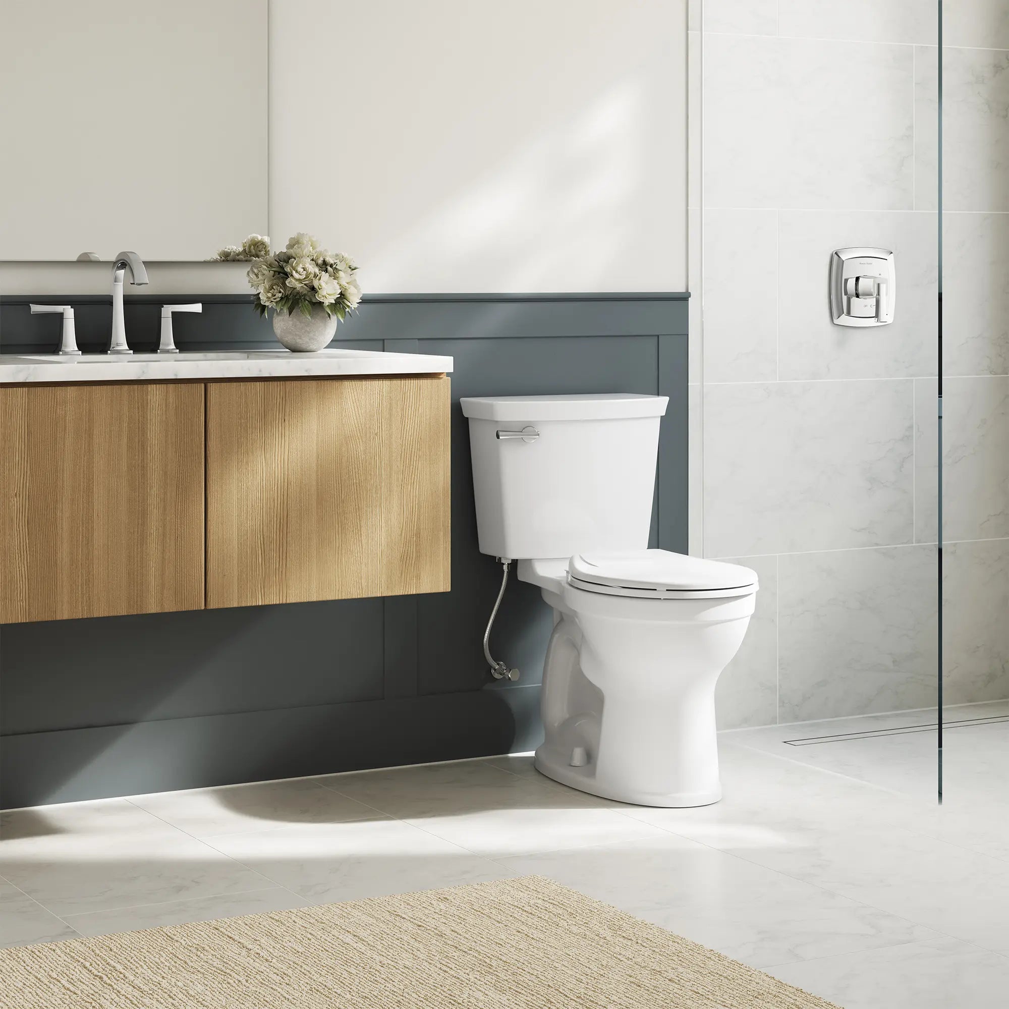 Champion Two-Piece 1.28 gpf/4.8 Lpf Chair Height Round Front Toilet with Seat // WHITE // 263145_Champion_EnvironmentCloseUp_747BA107SC020_0001_MAY2025_0_CDNwebp.webp