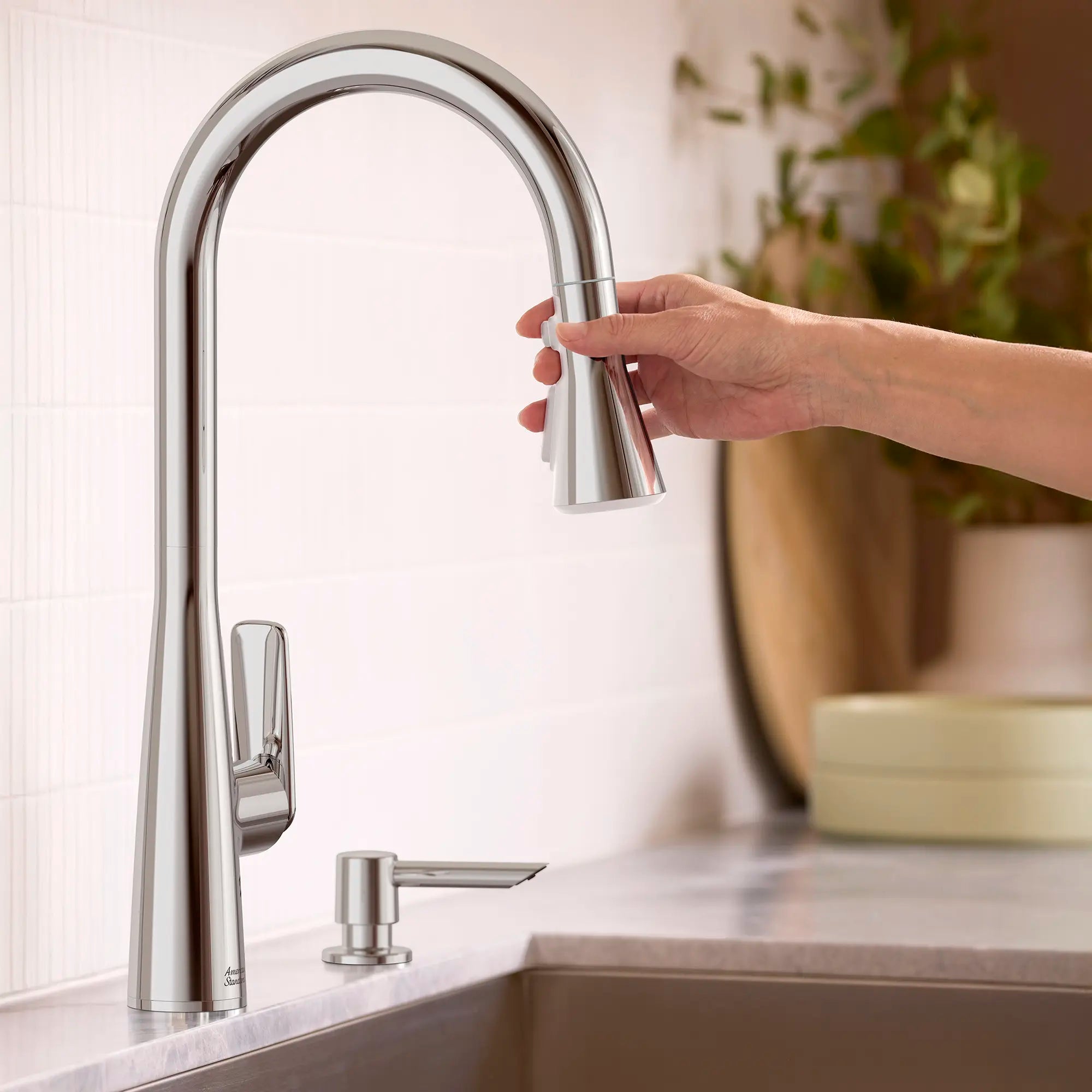 Aspirations Pull-Down Kitchen Faucet // POLISHED CHROME // 263730_Aspirations_EnvironmentCloseUp_1048810020_0001_APRIL2025_0_CDNwebp.webp