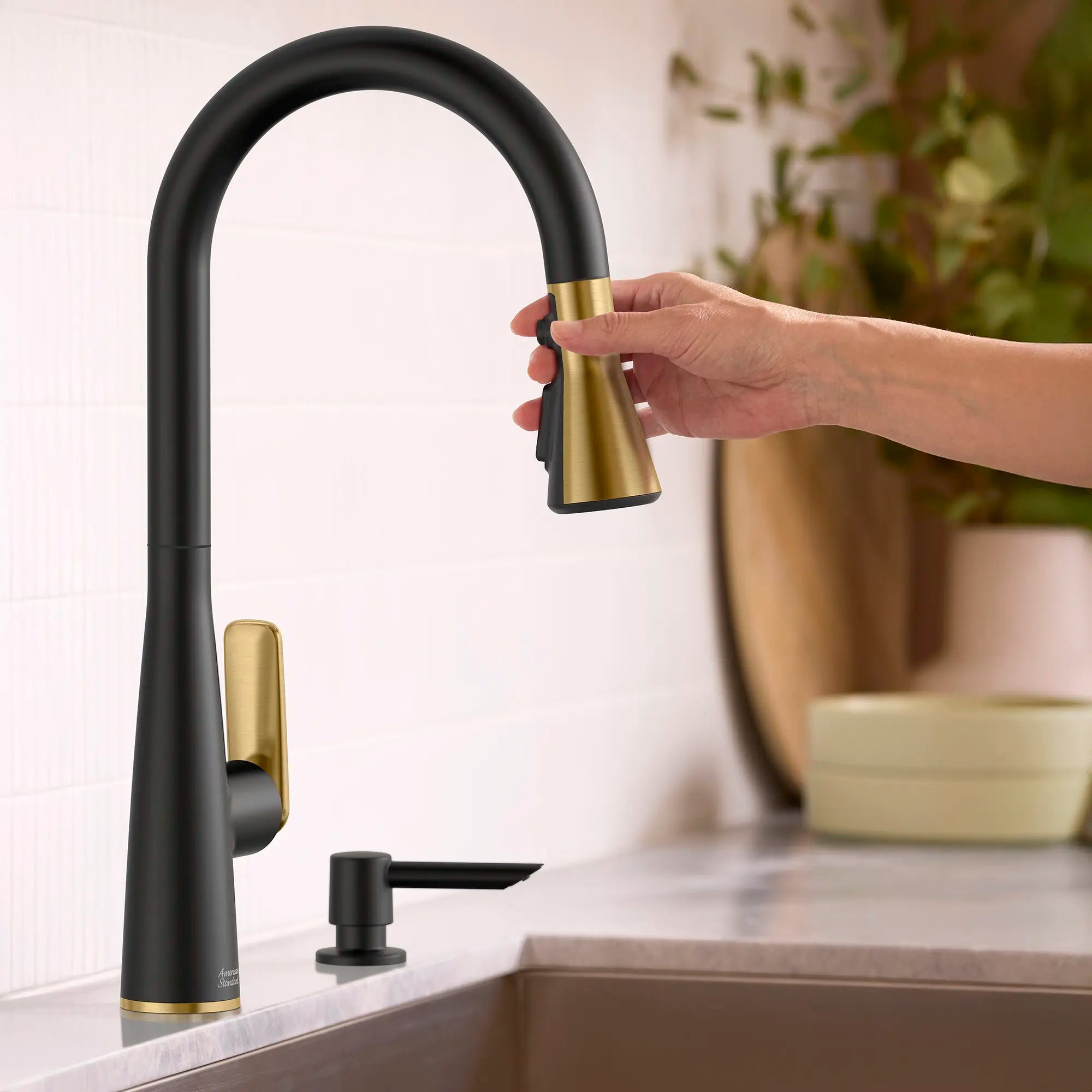 Aspirations Pull-Down Kitchen Faucet // MATTE BLACK/BRUSH COOL SUNRISE // 263734_Aspirations_EnvironmentCloseUp_1048814240_0001_APRIL2025_0_CDNwebp.webp