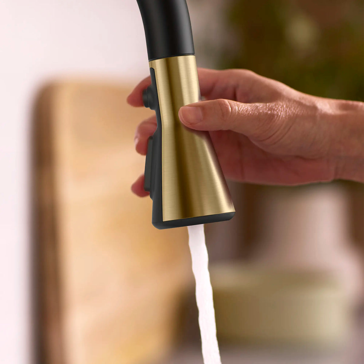 Aspirations Touchless Pull-Down Kitchen Faucet // MATTE BLACK/BRUSH COOL SUNRISE // 263740_Aspirations_EnvironmentCloseUp_1048804240_0001_MAY2025_0_CDNwebp_65d5b64e-8787-4099-a388-56bbfce6be36.webp