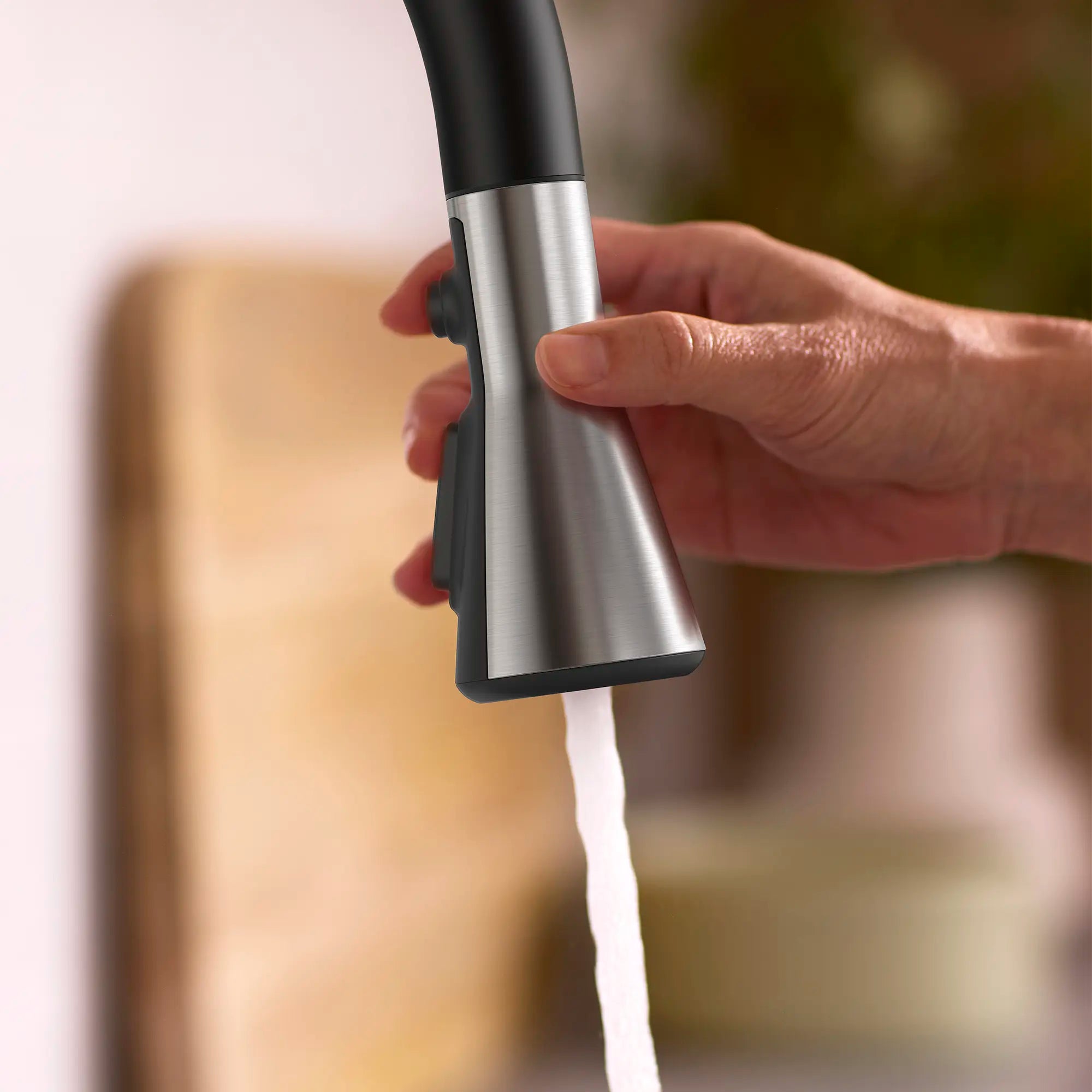 Aspirations Touchless Pull-Down Kitchen Faucet // MATTE BLACK/STAINLESS STEEL // 263741_Aspirations_EnvironmentCloseUp_1048804230_0001_MAY2025_0_CDNwebp_c1e5c3cf-dad8-4164-8598-64ded6266781.webp
