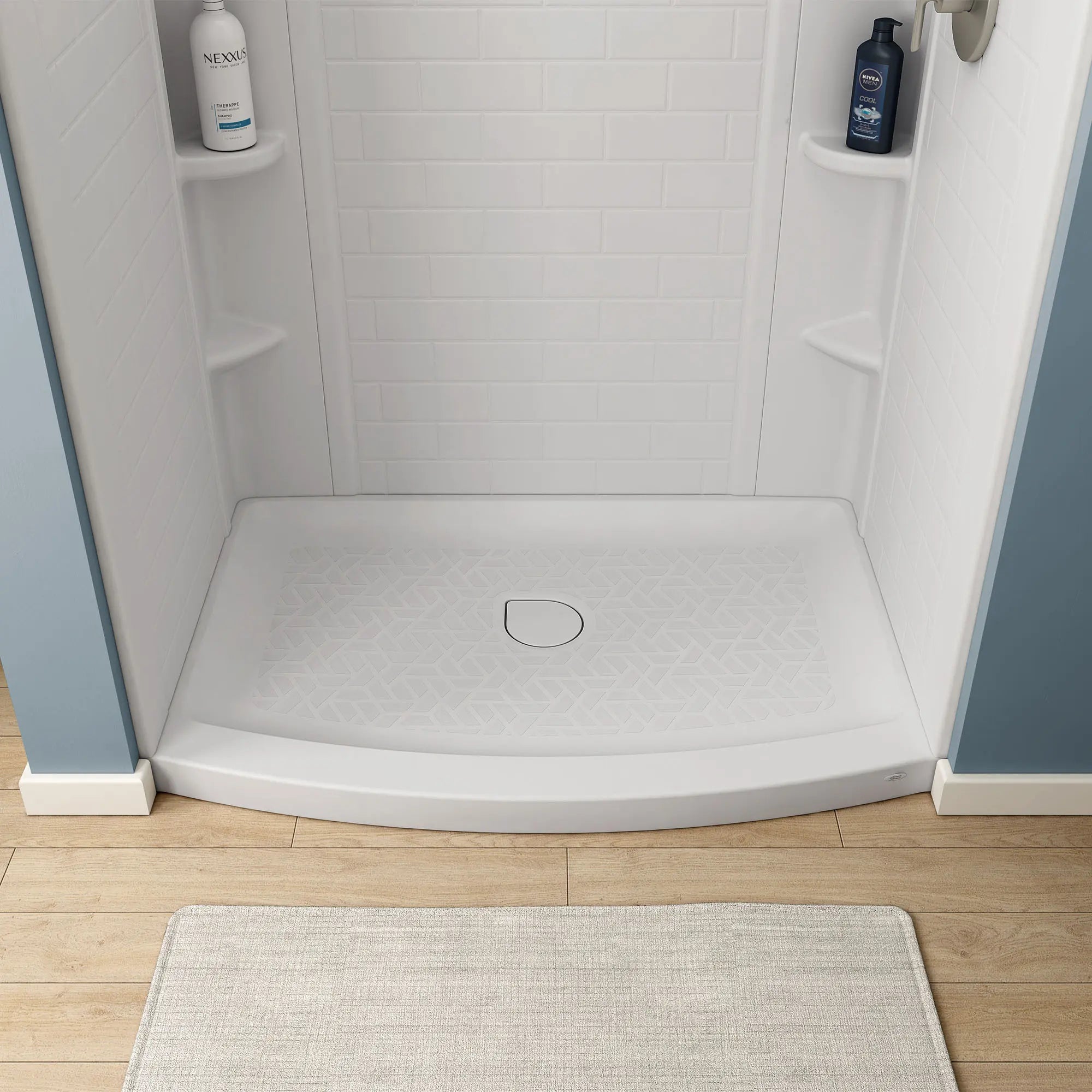 Elevate 48x30-inch Curved Shower Base with Center Drain Outlet // ARCTIC // 64727_A8015TCO.011_CDNwebp.webp