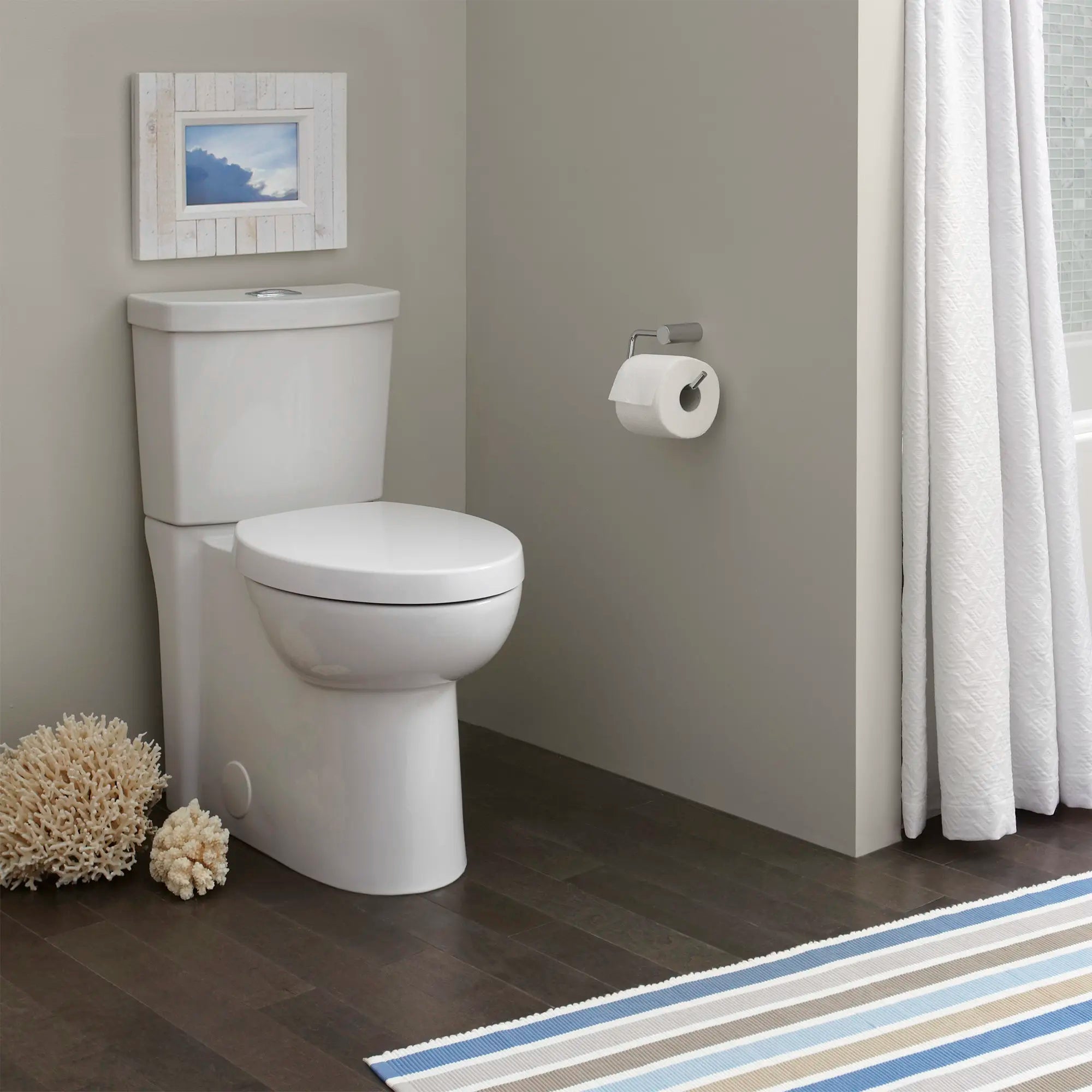 Studio® Skirted Two-Piece Dual Flush 1.28 gpf/4.8 Lpf and 1.0 gpf/3.8 Lpf Chair Height Elongated Toilet With Seat // WHITE // 71295_B-2794204020_0_CDNwebp_55ac932f-d9ec-47f6-83ea-2ec6c6810cf2.webp
