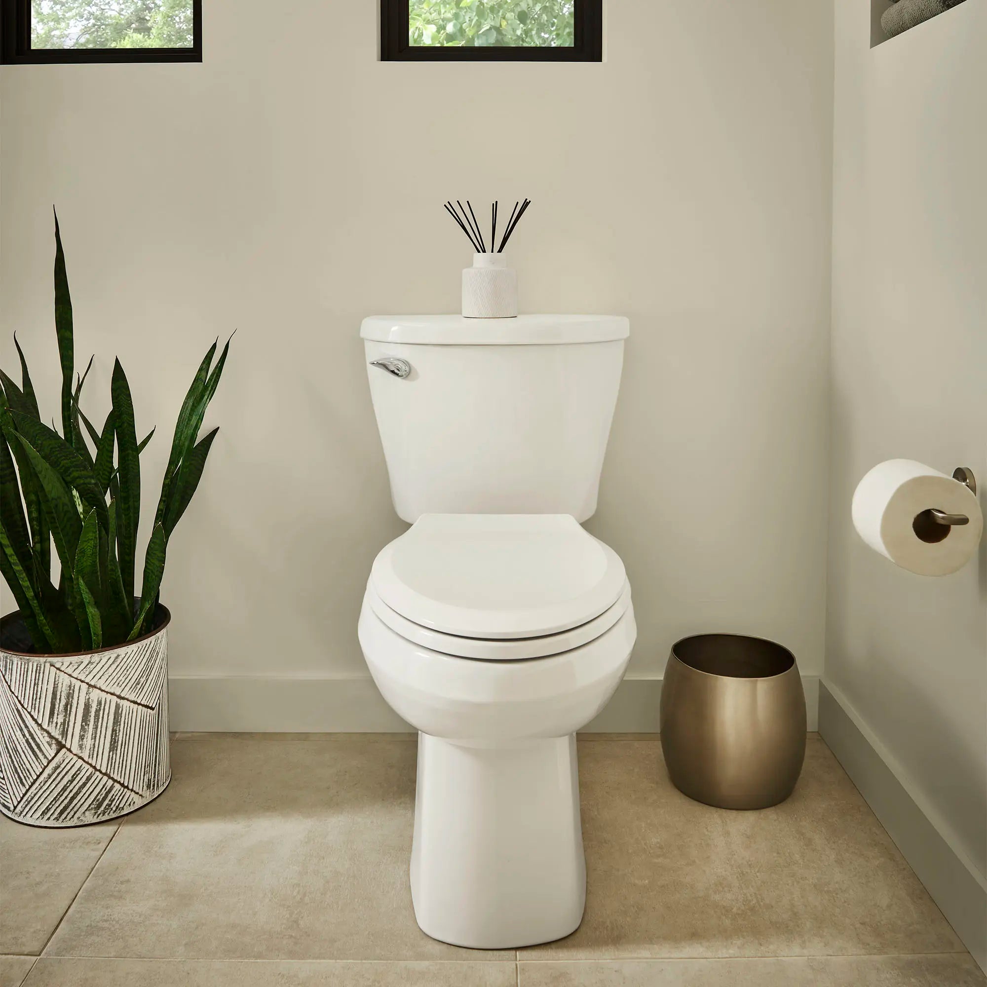 Reliant® Two-Piece Standard Height Elongated Toilet with Seat // WHITE // 80239_B-773CA101.020_2_0_CDNwebp_37055d67-77e6-4290-aa84-89b44d6687bc.webp